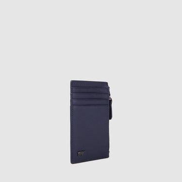 Angled view of a deep blue Braun Büffel leather card holder with side zip compartment