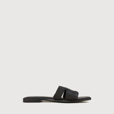 Black leather slide sandal with wide straps by Braun Buffel
