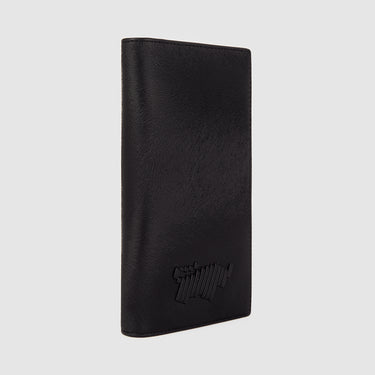 Braun Büffel black leather long wallet, angled side view with embossed logo
