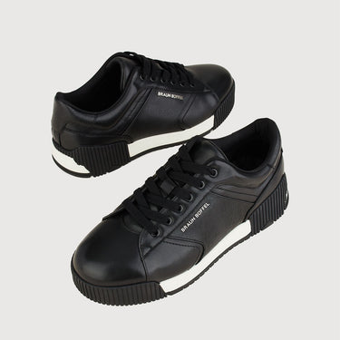 Braun Buffel black leather sneakers angled view