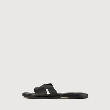 Minimal black leather sandal with clean silhouette by Braun Buffel